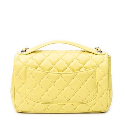 CHANEL made in italy
Quilted yellow leather...