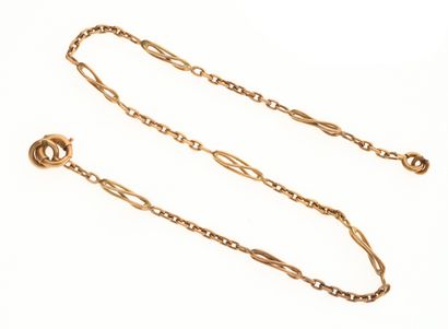 Gold bracelet with alternating links and...