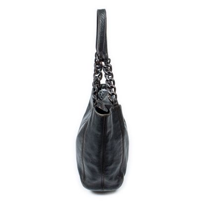 CHANEL
Black grained leather shopping bag...