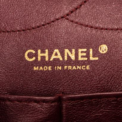 CHANEL
Large 2.55 reedition bag in burgundy...