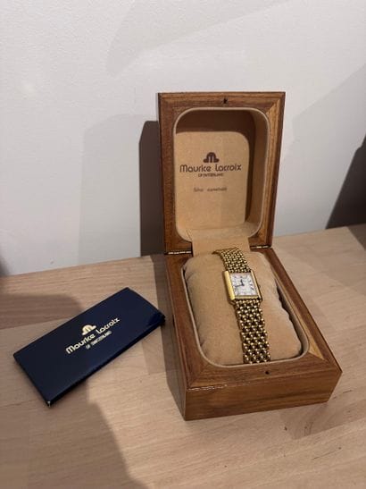 MAURICE LACROIX
Gold-plated steel watch,...