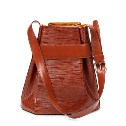 LOUIS VUITTON
Shoulder bag in bronze-colored...