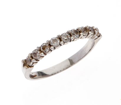 Half wedding ring 
in 750/°° white gold and...