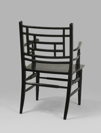 20th century work
Black lacquered wood armchair...
