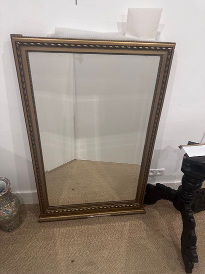 Louis XVI style wood and gilded stucco, beveled...