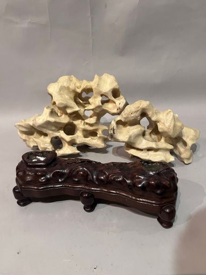Two decorative ELEMENTS in hard stone. A...