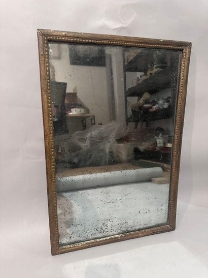 Rectangular giltwood mirror with pearl frieze...