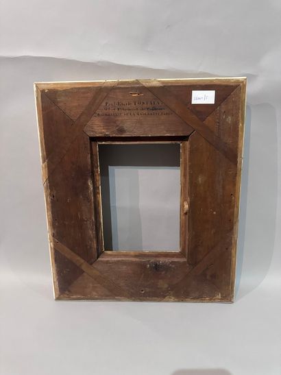 Wood and gilded stucco frame decorated with...