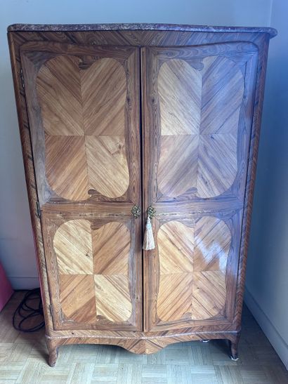 WOODEN ARMOIRE inlaid with butterfly wings,...