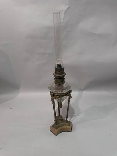 Gilt bronze kerosene LAMP with three uprights...