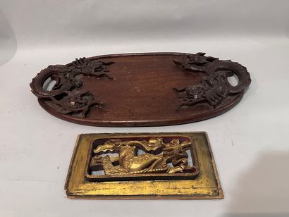 A carved wooden TRAY with dragons in high...