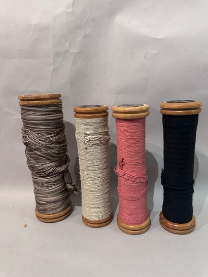 Four fabric ROLLER HOLDERS in wood and metal....
