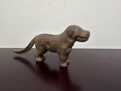 Cast iron CASSE-NOIX decorated with a dog....