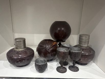 CHINA - Carved coconut set including: a standing...