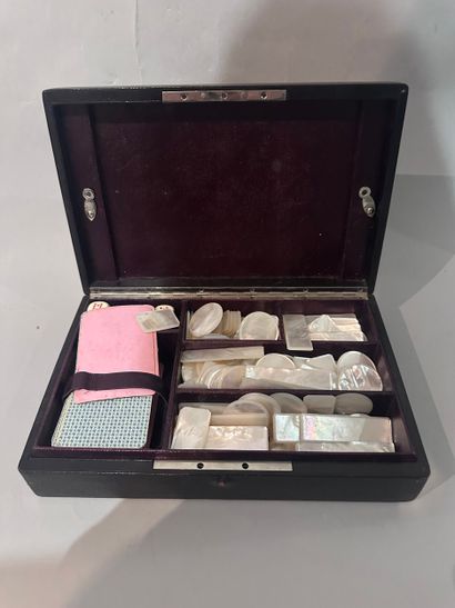 Leather game case with pearly chips, dice...