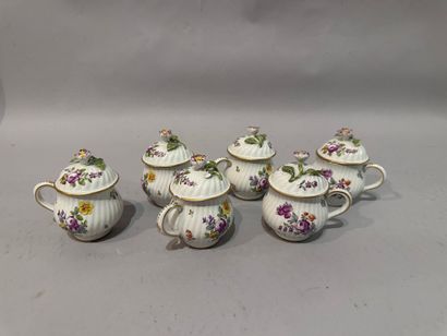 Small polychrome and gilded porcelain cream...