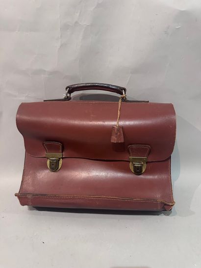 Worn burgundy leather TOWEL.