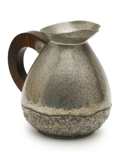 Robert DELAVAN 
Hammered pewter pitcher
Handle...