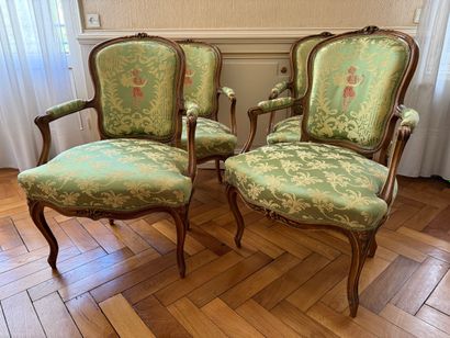 Suite of four armchairs in natural wood,...