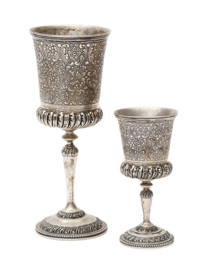 Two silver footed GLASSES with chased and...