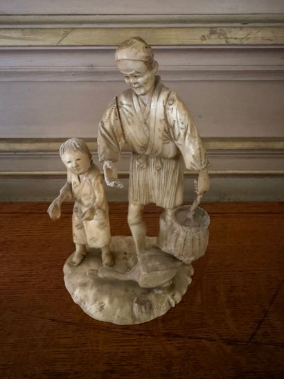 Marine ivory OKIMONO depicting a farmer,...