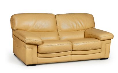 ROCHE BOBOIS
Cream leather two-seater sofa....