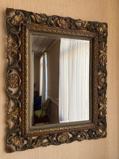 MIRROR with patinated and gilded wood surround...