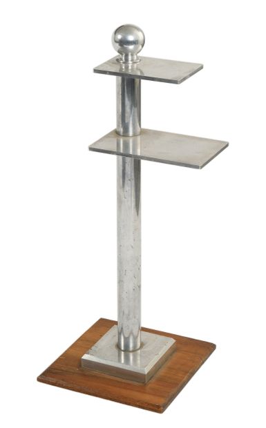 MODERNIST piece 
Aluminum coffee table resting...