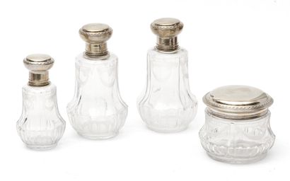 Cut and engraved glass toiletry set decorated...