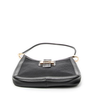 GUCCI
Sac Hobo en toile guccissima et cuir...
