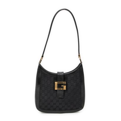 GUCCI
Sac Hobo en toile guccissima et cuir...