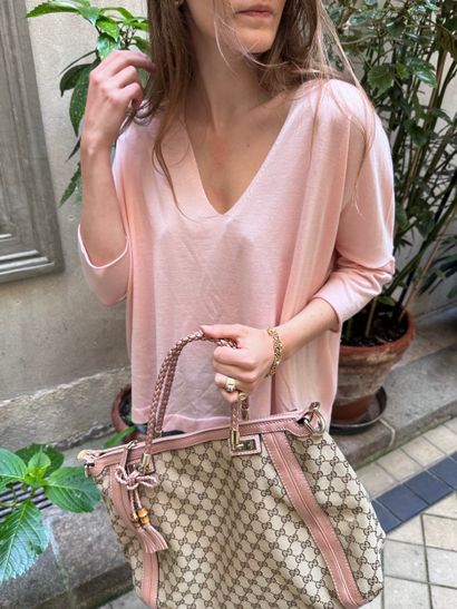 PAUL JOE
Pull manche 3/4 en laine rose.
Taille...