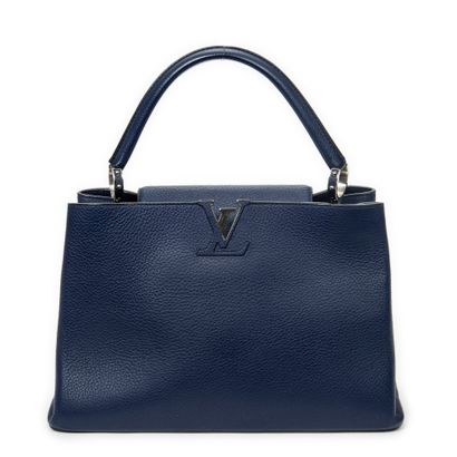 LOUIS VUITTON
Sac modèle 