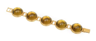 LALIQUE 
Bracelet en métal doré et cabochon...