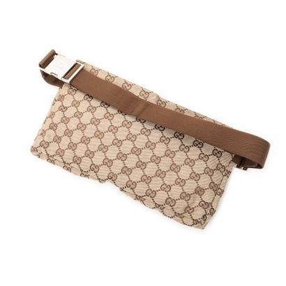 GUCCI
Sac ceinture double poche en toile...
