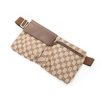 GUCCI
Sac ceinture double poche en toile...