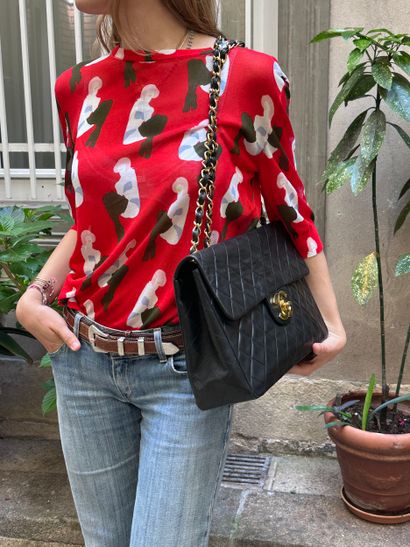NINA RICCI
Petit pull manche 3/4 en viscose...