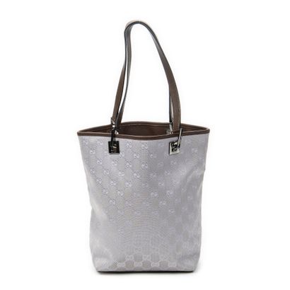 GUCCI
Sac seau en toile guccissima mauve...