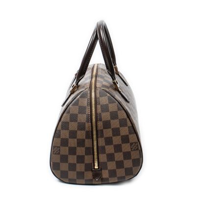 LOUIS VUITTON
Sac modèle 
