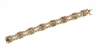 Bracelet 
articulé en or jaune ajouré 18k...