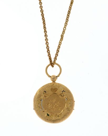 Pendentif porte-photo
en or jaune 18K 750/°°...