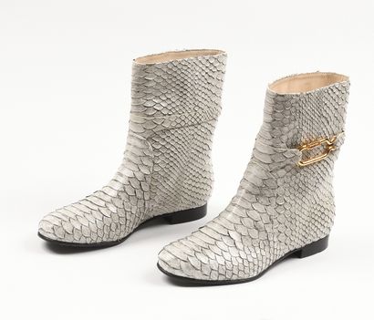 SERGIO ROSSI
Paire de bottines en cuir blanc...