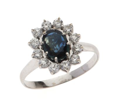 Bague
en or gris 18K 750/°° ornée d'un saphir...