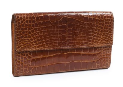 LOUIS VUITTON, commande spéciale
Portefeuille...