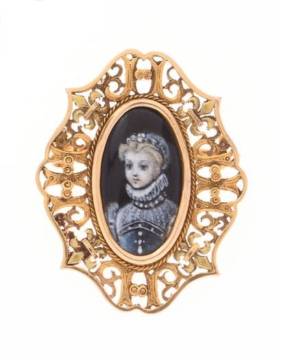 Broche
en or jaune 18K 750/°° et émail à...