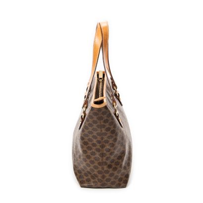 CELINE
Sac vintage de type shopping en toile...