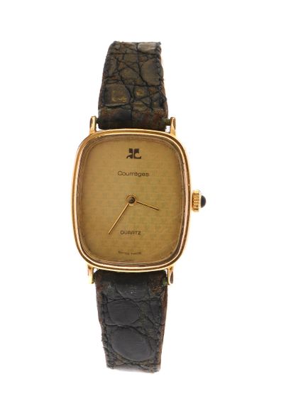 COURREGES 
Gilt steel ladies' watch, tonneau-shaped...
