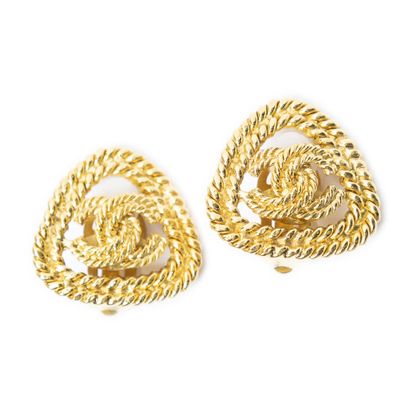 CHANEL 
Pair of gold-tone metal clip-on earrings...