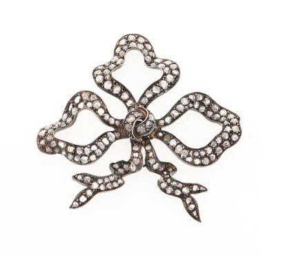 Part of a transformable piece of jewelry...