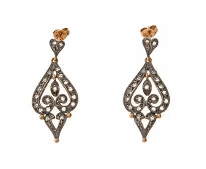Pair of openwork silver and 585°/°° gold...